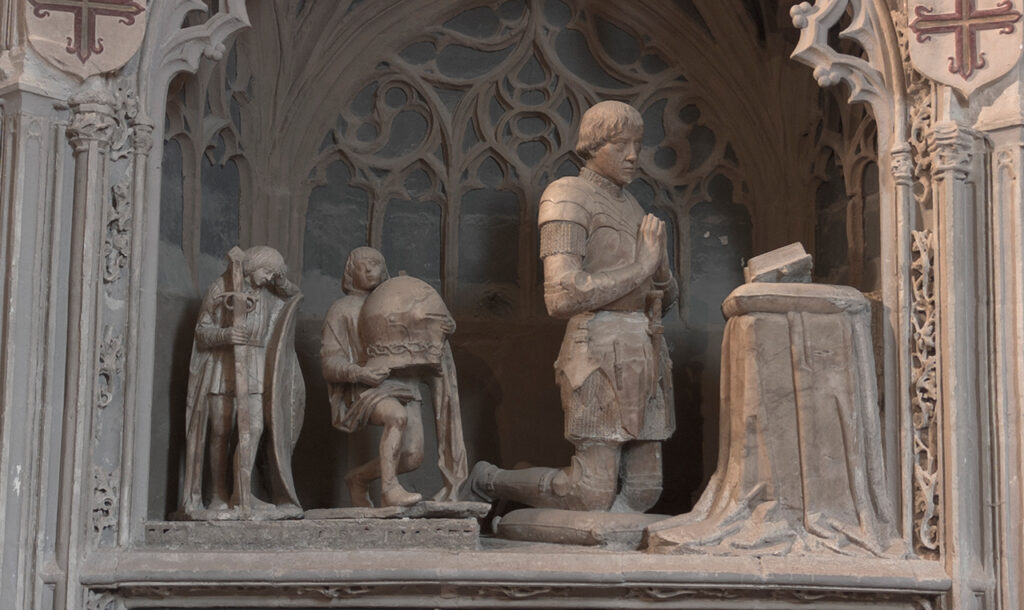 Sepulcro de Don Pedro de Acuña, primer conde de Buendía. Tardogótico, representa al duque arrodillado orando frente a una mesa con un misal. Detrás de él dos pajes que sostiene un casco, una espada y un escudo.