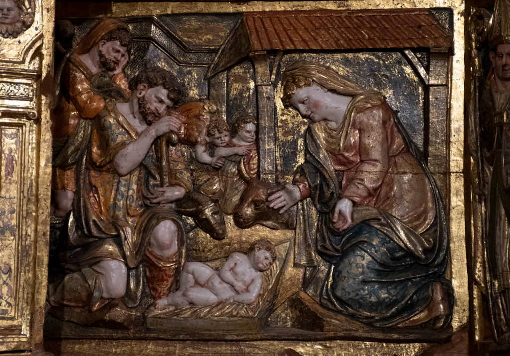 Relieve renacentista del retablo mayor de la iglesia de Nuestra Señora de la Asunción de Melga de Yuso, que representa la Adoración de los Pastores.